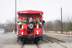 Sanat  Mrs. Claus,  elves Train Crew, Conrail Execs Pose for a picutre. 